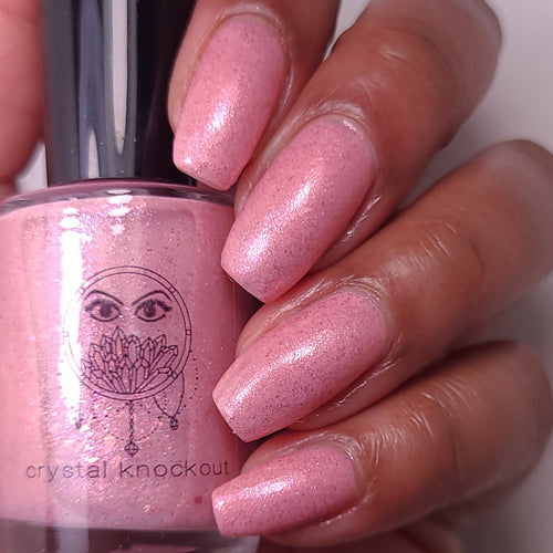nail polish by crystal knockout, rose quartz clash, a pink crelly with rose gold micro flakies and iridescent pink shimmer and flakes